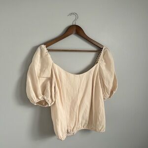 Never worn cream blouse with pearl detail on shoulders!